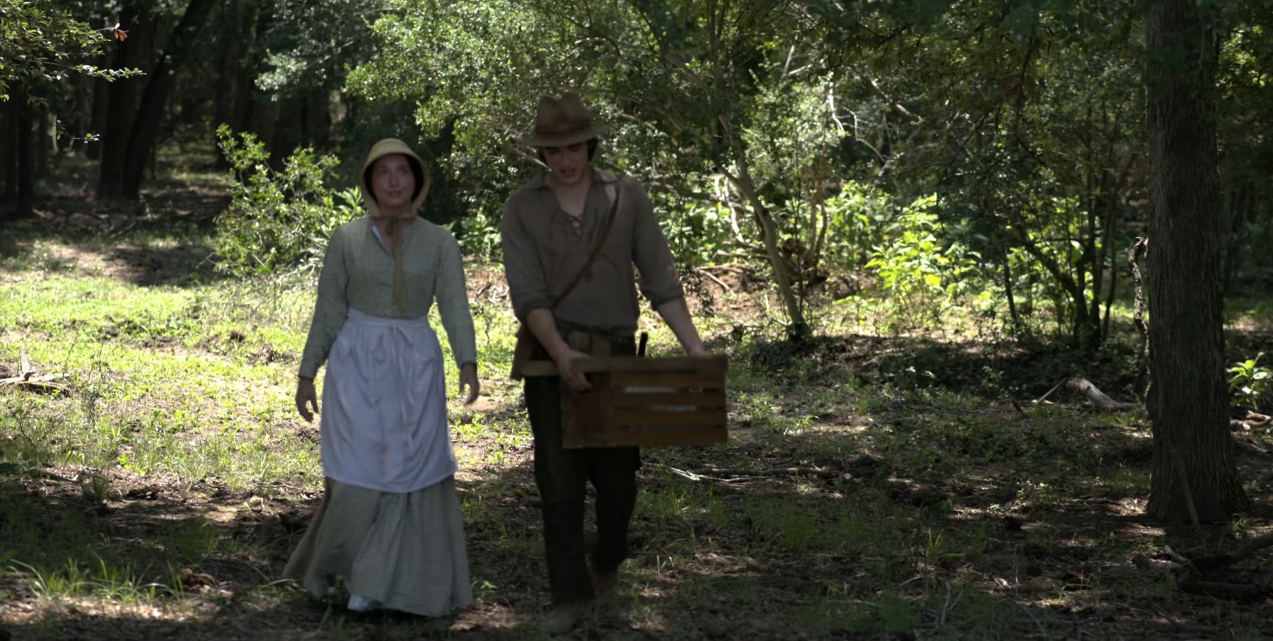 A dramatic still of Evaline DeWitt and John E. Gaston from Texas Legacy in Lights.